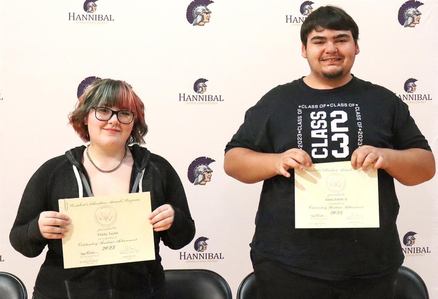  Trinity Taylor and James Jolliffe Jr. are presented with an award.