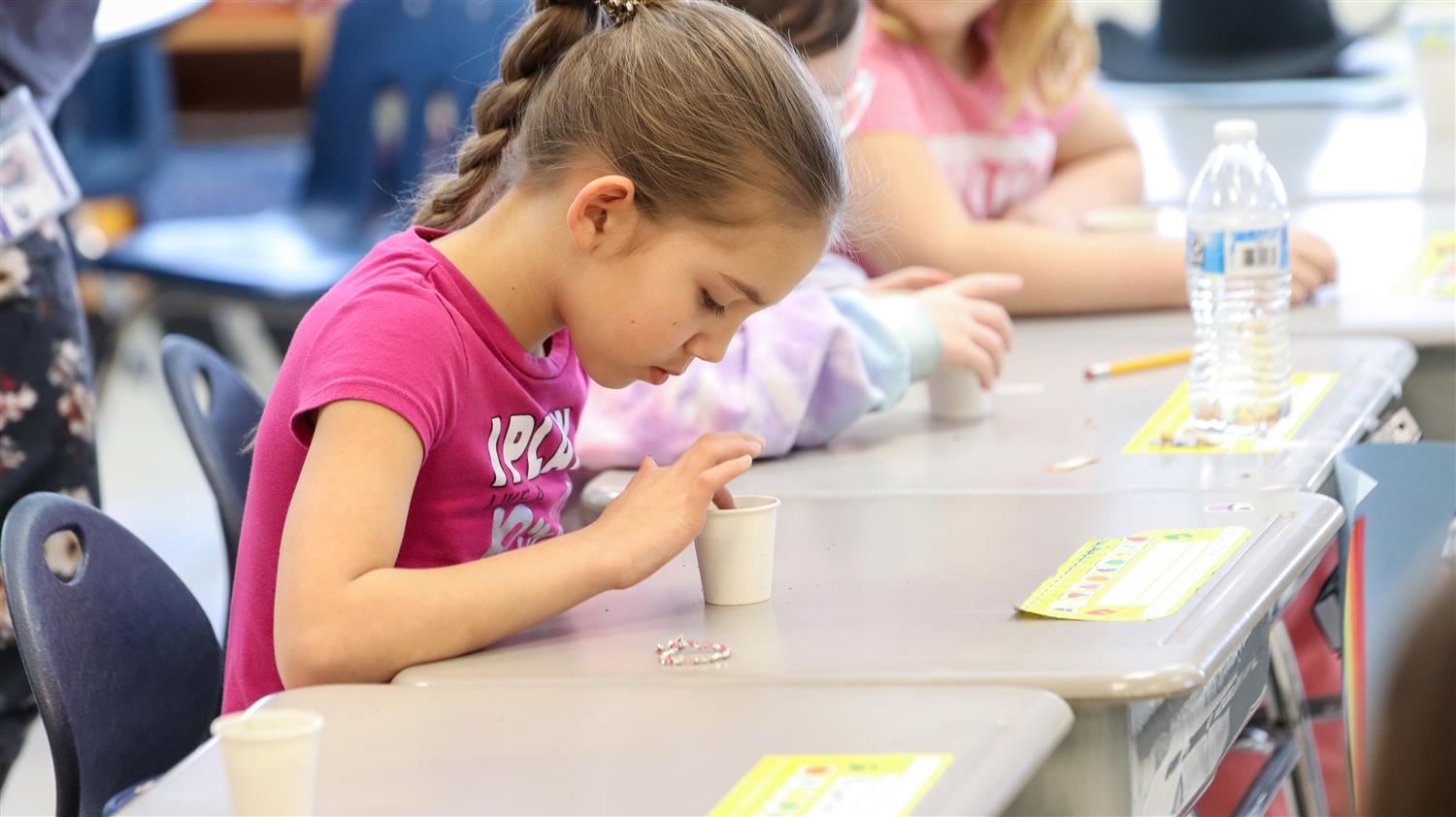  Second-graders plant tomato seeds during AG Literacy Week.