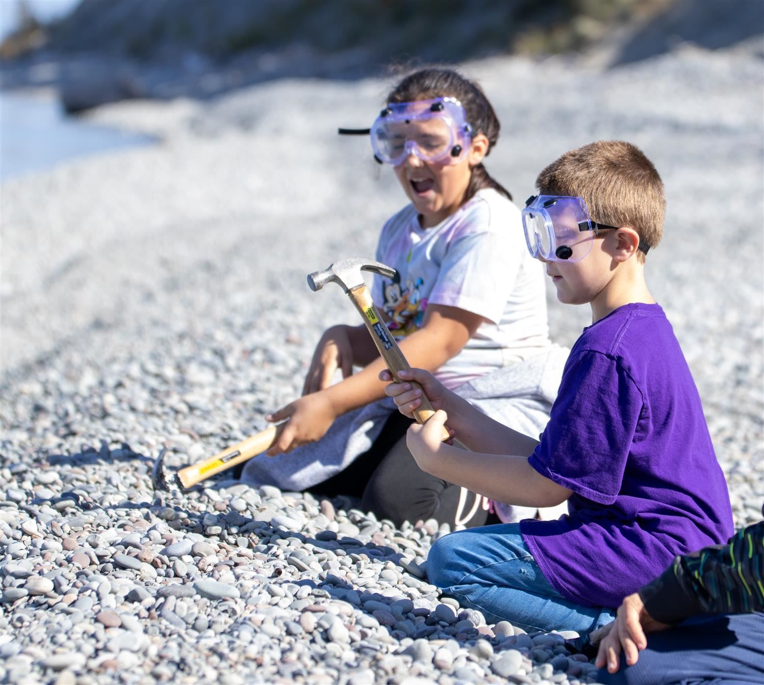  Fairley fourth graders break rocks during a recent STEM lesson exploring geological features.