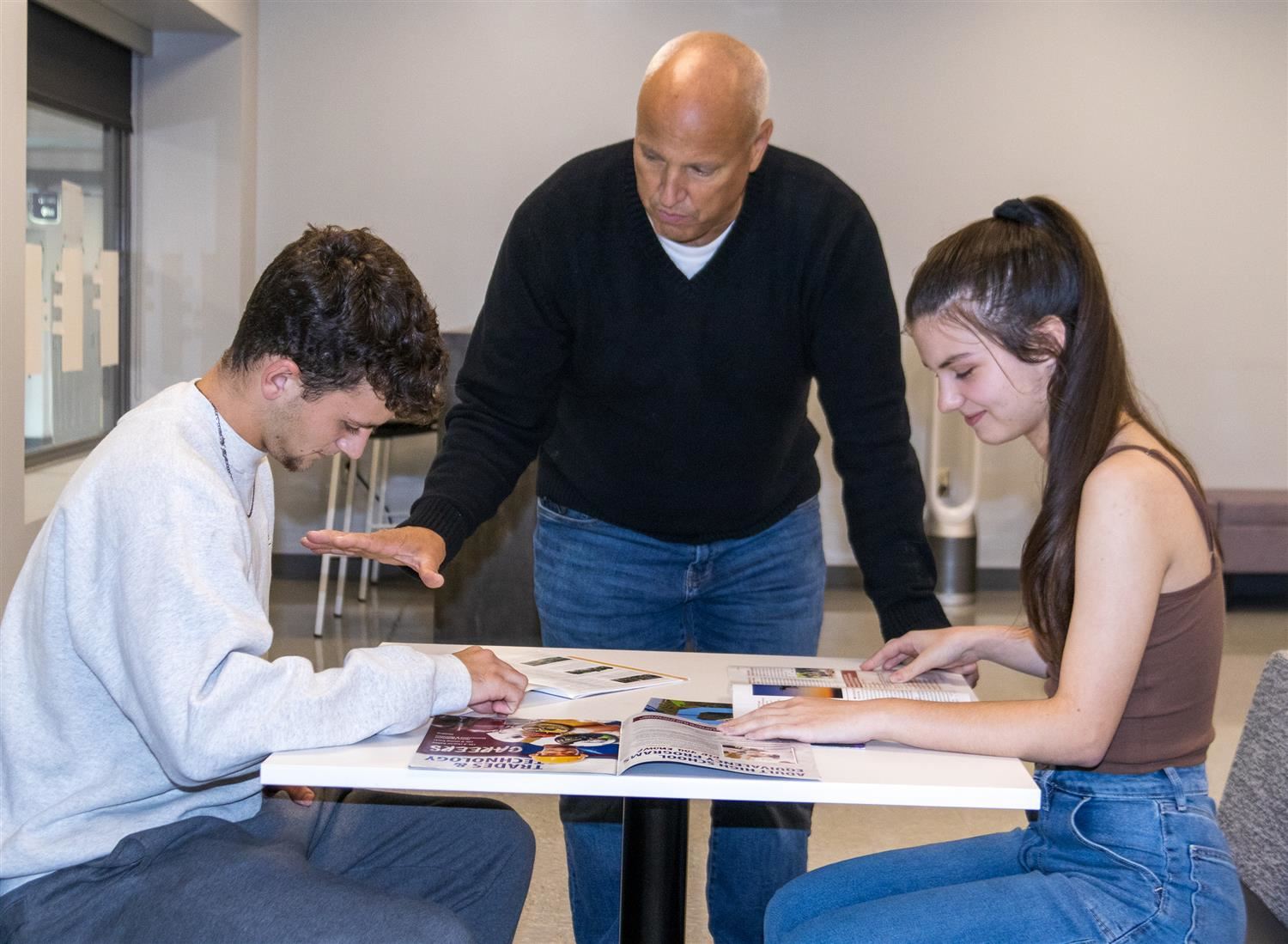  Students meet with Principal and Career Resource Specialist Steve Dunn in the career center