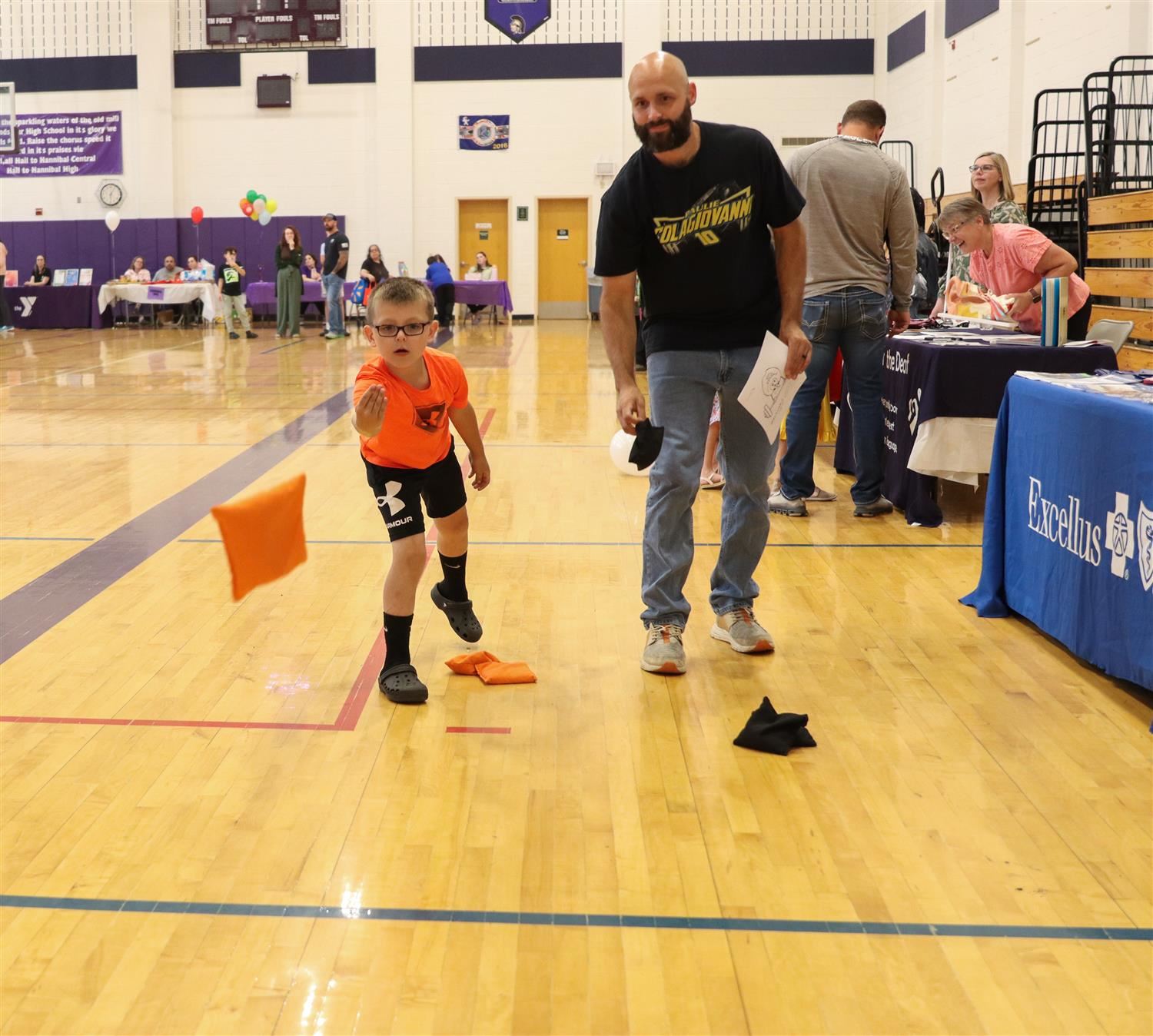  A HCSD family enjoys a game of cornhole during Healthy Family Night.