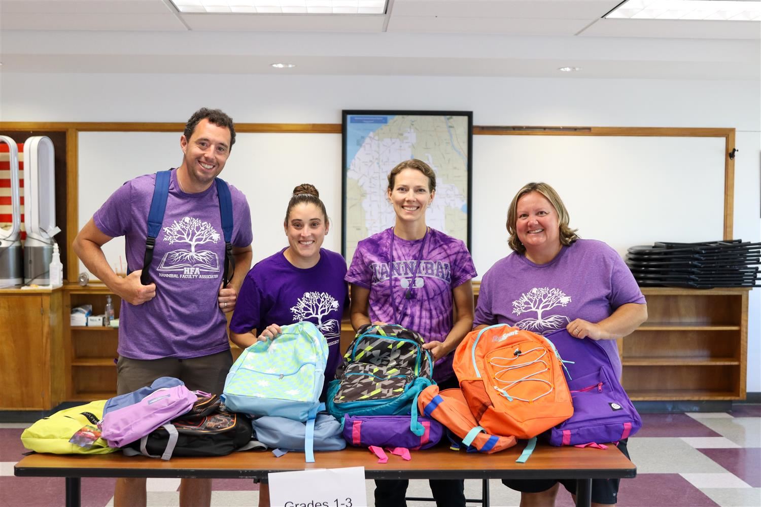 Members of the HFA helped distribute school supplies as part of the annual Stuff-a-Bus campaign.